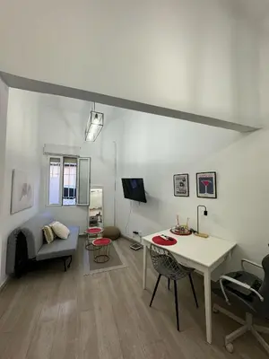 Una televisión o centro de entretenimiento en Piso entero en Bellas Vistas