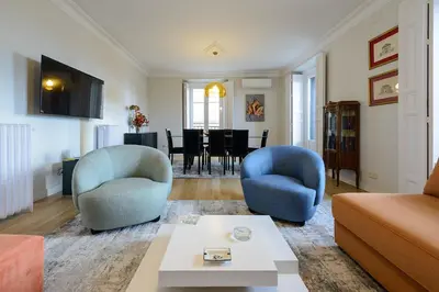 Una televisión o centro de entretenimiento en Apartamento con vistas impresionantes 170m2 muy amplio y lujoso- 1 Min Plaza Mayor