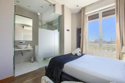 Cama o camas de una habitación en Dobo Madrid Gran Vía