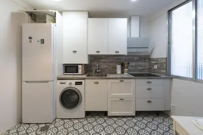 Una cocina o zona de cocina en Cozy apartment with balconies in the center of Temporal TOL254