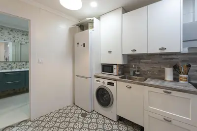 Una cocina o zona de cocina en Cozy apartment with balconies in the center of Temporal TOL254