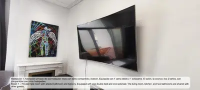 Una televisión o centro de entretenimiento en Plaza Opera Home