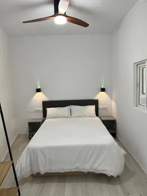 Cama o camas de una habitación en The new gallery