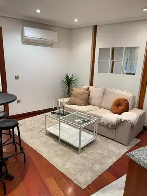 Zona de estar de Exyca Homes Gran Via