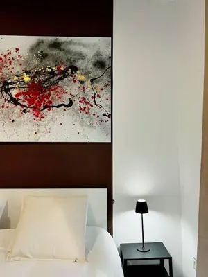Cama o camas de una habitación en Plaza España Rooms A