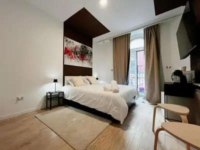Cama o camas de una habitación en Plaza España Rooms A