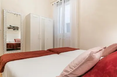 Cama o camas de una habitación en Reina 1 by Forever Rentals