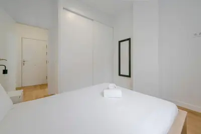 Cama o camas de una habitación en Estilo con parking para 4, vive La Latina