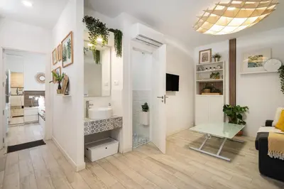 Una televisión o centro de entretenimiento en Nice apartment in Prosperidad - D1