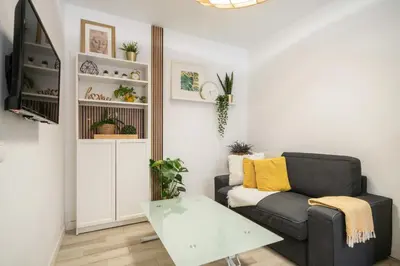 Una televisión o centro de entretenimiento en Nice apartment in Prosperidad - D1