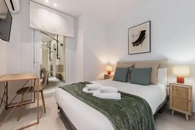 Cama o camas de una habitación en Waou Urban Home Chamberi