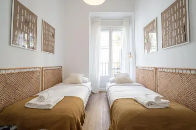 Cama o camas de una habitación en Luxury Malasaña by Hogar 4