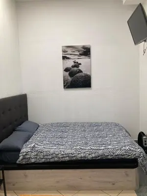 Cama o camas de una habitación en Hostal Mayor Plaza