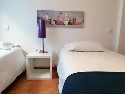 Cama o camas de una habitación en Alojamiento Temporal el Puente