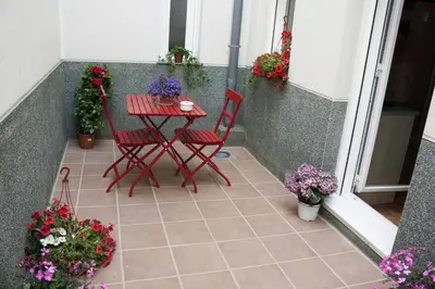 Un balcón o terraza de Alojamiento Temporal el Puente