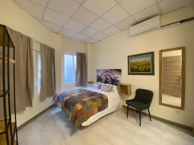 Cama o camas de una habitación en Girasol