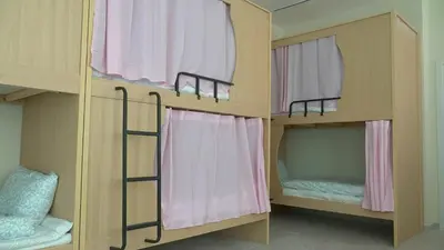 Cama o camas de una habitación en ROX Madrid