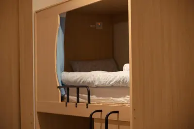 Cama o camas de una habitación en ROX Madrid