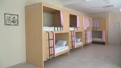 Cama o camas de una habitación en ROX Madrid