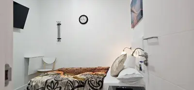 Cama o camas de una habitación en Habitaciones Gran Via