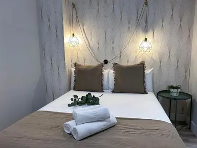 Cama o camas de una habitación en Madrid Experience - 3 dormitorios en el Centro
