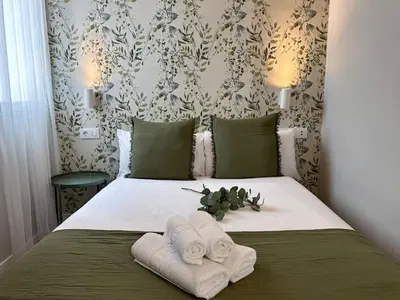 Cama o camas de una habitación en Madrid Experience - 3 dormitorios en el Centro