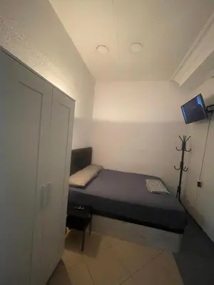 Cama o camas de una habitación en Hostel La Latina