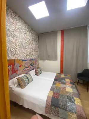 Cama o camas de una habitación en Bodegón