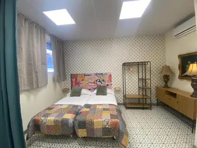 Cama o camas de una habitación en Bodegón