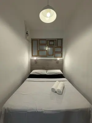 Cama o camas de una habitación en Encantador apartamento céntrico y equipado