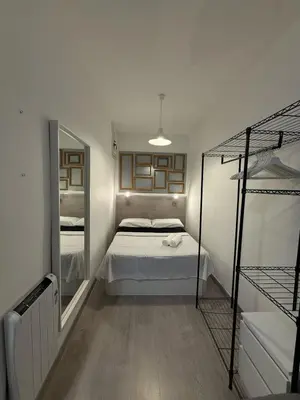 Cama o camas de una habitación en Encantador apartamento céntrico y equipado
