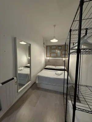 Cama o camas de una habitación en Encantador apartamento céntrico y equipado