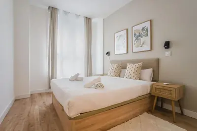 Cama o camas de una habitación en Spacious stylish - 2BD 1BTH - Cuatro Caminos