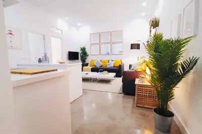 Una televisión o centro de entretenimiento en Amanecer Urbano para 6 en Sol