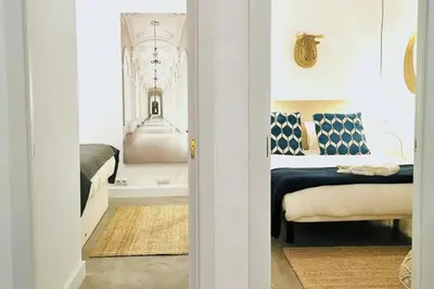 Cama o camas de una habitación en Amanecer Urbano para 6 en Sol
