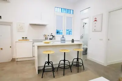 Una cocina o zona de cocina en Amanecer Urbano para 6 en Sol