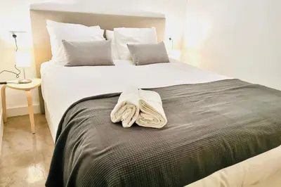 Cama o camas de una habitación en Amanecer Urbano para 6 en Sol