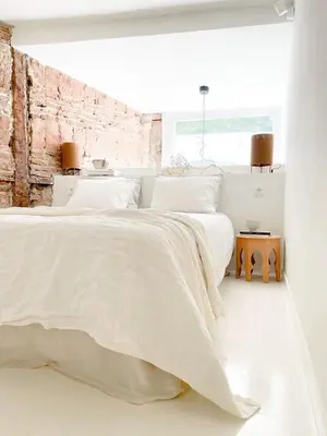 Cama o camas de una habitación en Radiant Loft in the Heart of Madrid