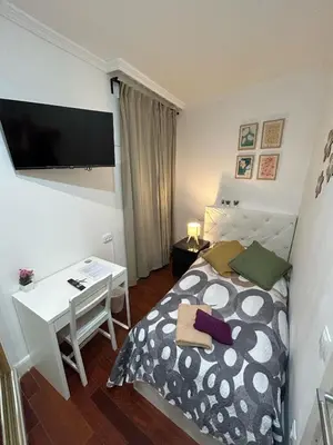 Cama o camas de una habitación en Alojamiento Angel