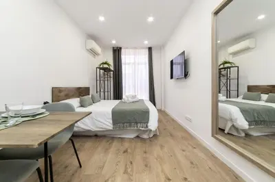 Cama o camas de una habitación en Deluxe III - Ferga Suites
