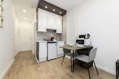 Una cocina o zona de cocina en Deluxe III - Ferga Suites