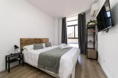 Cama o camas de una habitación en Deluxe V - Ferga Suites