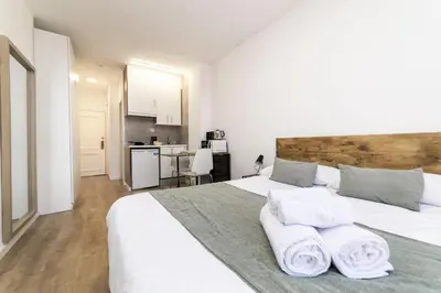 Cama o camas de una habitación en Deluxe V - Ferga Suites