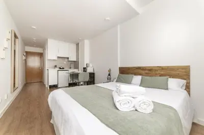 Cama o camas de una habitación en Deluxe VI - Ferga Suites