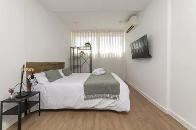 Cama o camas de una habitación en Deluxe VI - Ferga Suites