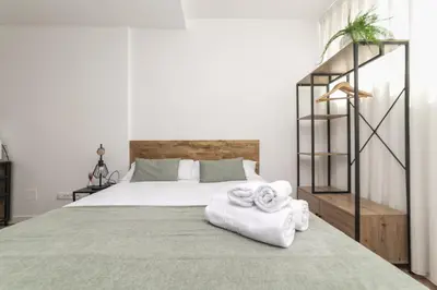 Cama o camas de una habitación en Deluxe VI - Ferga Suites