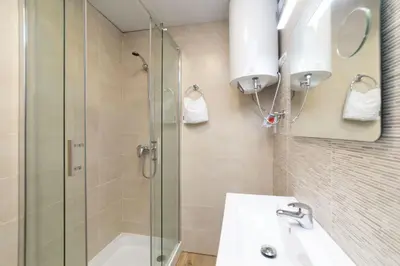 Un baño de Luxury XIII - Ferga Suites