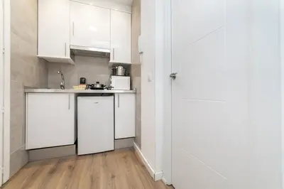 Una cocina o zona de cocina en Luxury IX - Ferga Suites