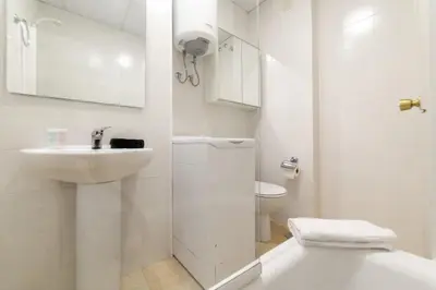 Un baño de Classy I - Ferga Suites