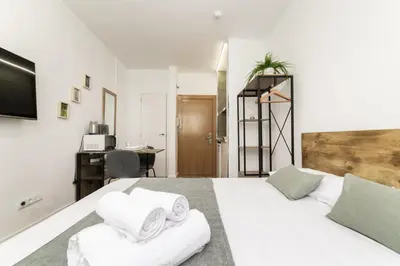 Cama o camas de una habitación en Classy V - Ferga Suites